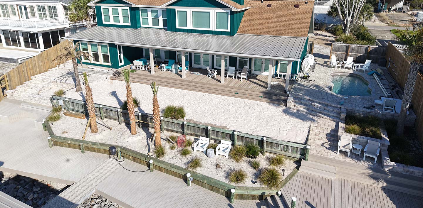 Background image displaying cutom landscaping design and build project on waterfront property pensacola