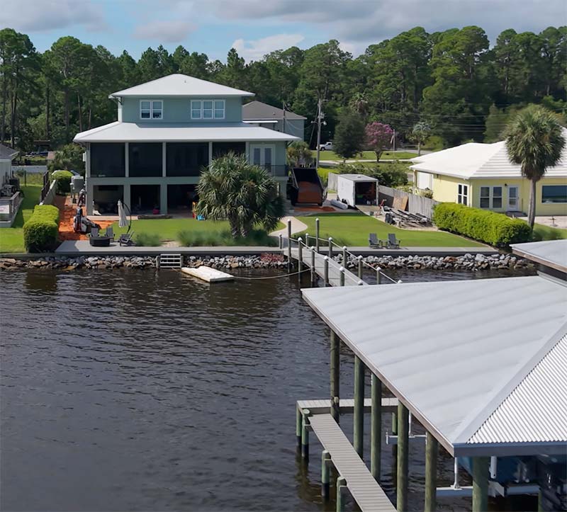 Waterfront view of native plants designed for coastal landscaping