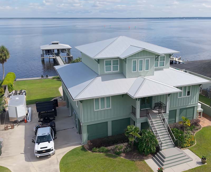 Waterfront landscape design home overlooking the water