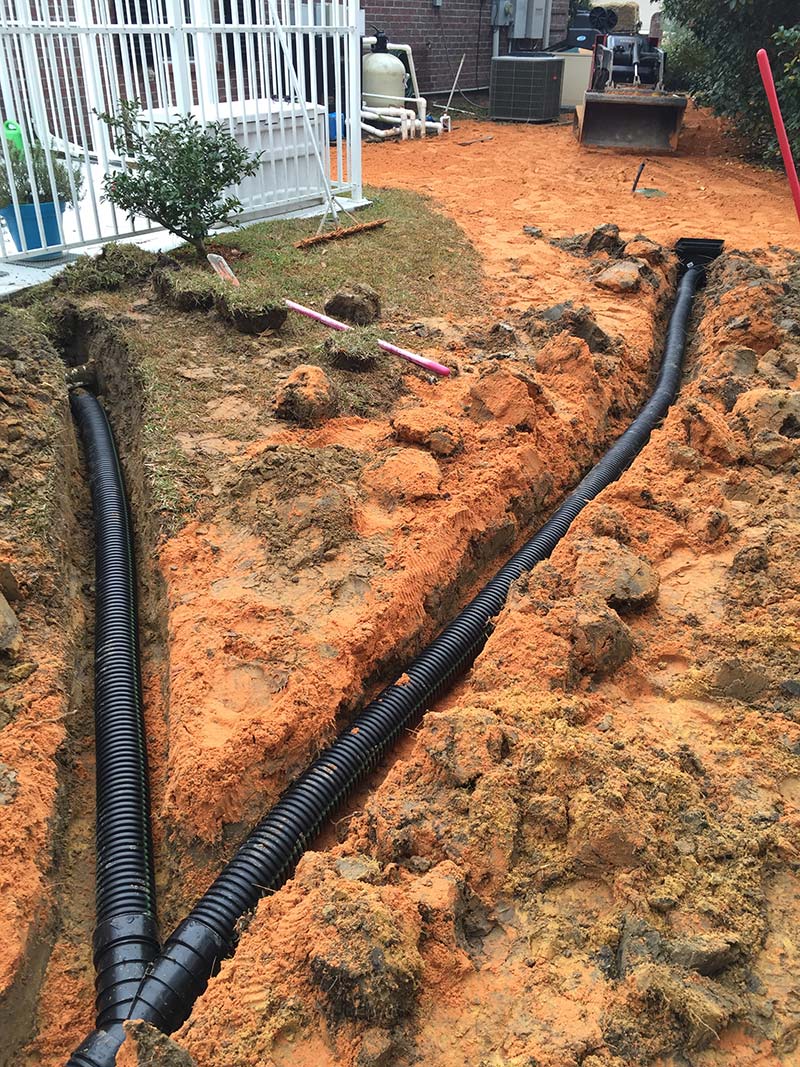 Ground work dug up to bury some irrigation pipes