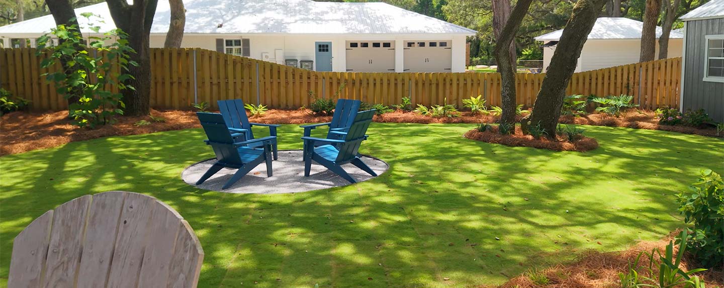 Outdoor Living space with chairs around a firepit